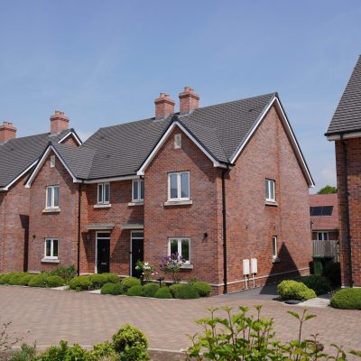 New,Housing,Estate,In,Suburban,Uk,Town.,New,Build,Houses